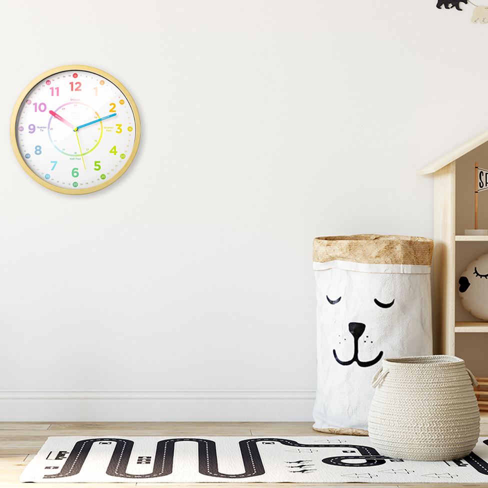 Children's room with a clock, storage bin, and toy shelf.